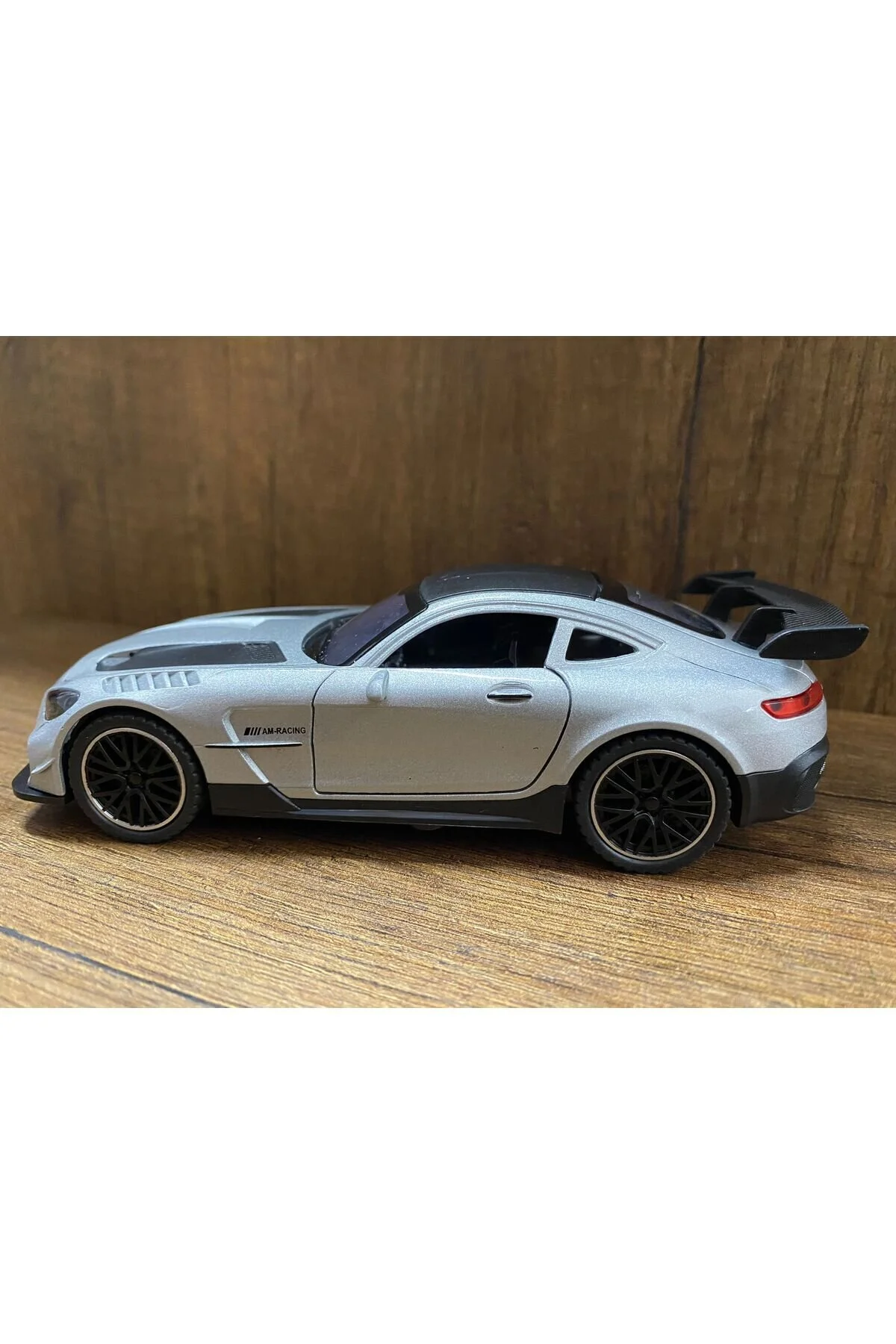 ماشین اسباب بازی کاپوت صندوق عقب درب خودرو مرسدس امگ جیتر بنز مدل AMG GTR را باز میکند scntoys