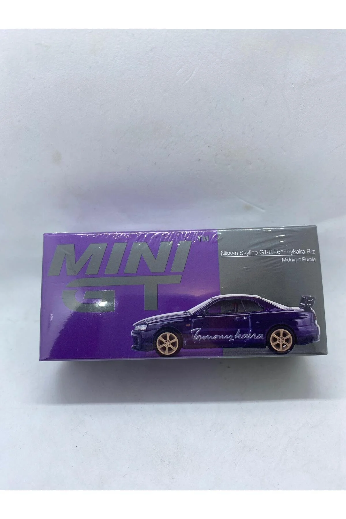 ماشین اسباب بازی نیسان اسکای لاین GT R R34 TOMMYKAIRA Z MIDNIGHT PURPLE NO.616 mini gt