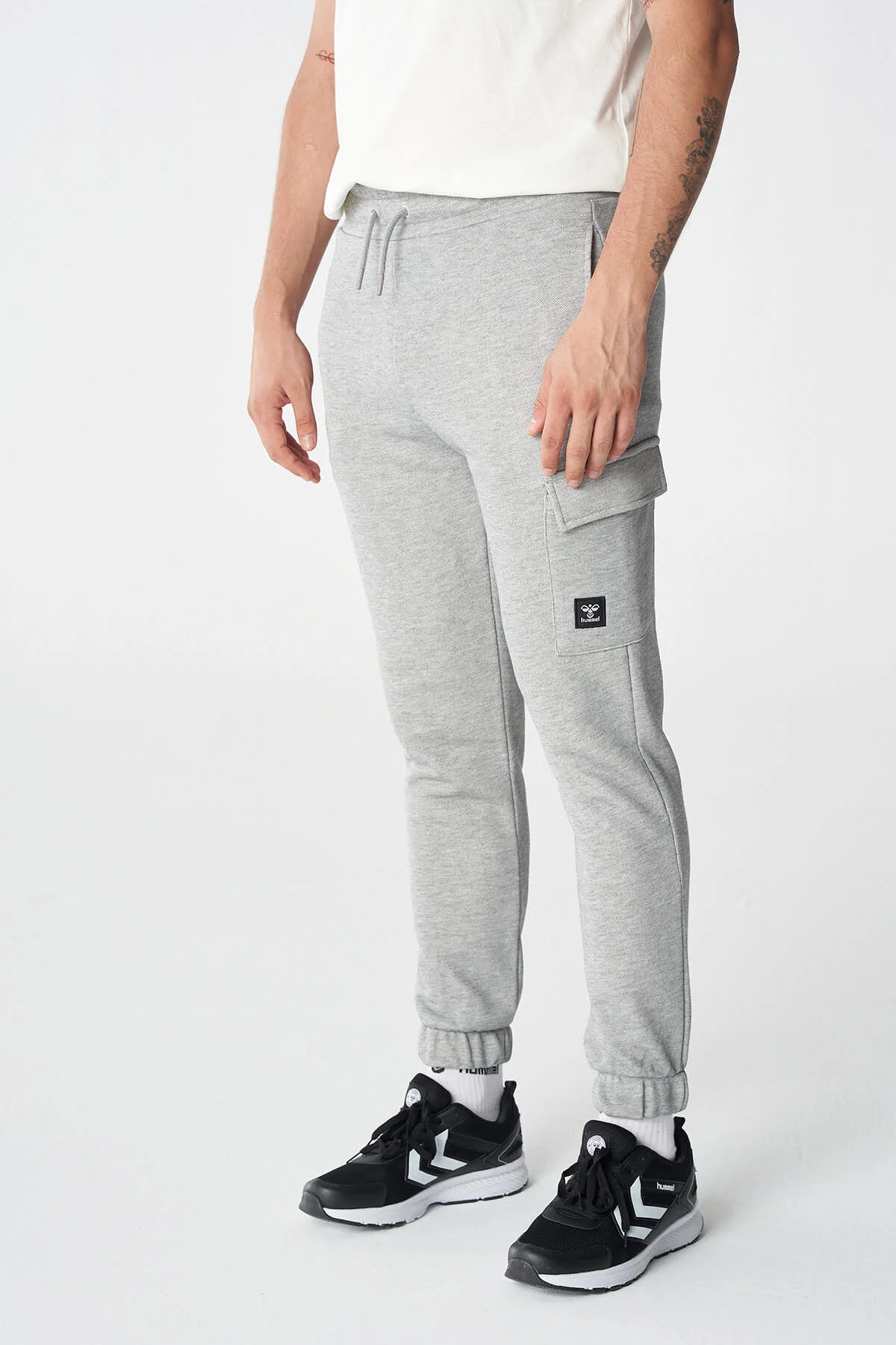 شلوار گرمکن خاکستری مردانه خطبه نیک جگر شش هومل hummel