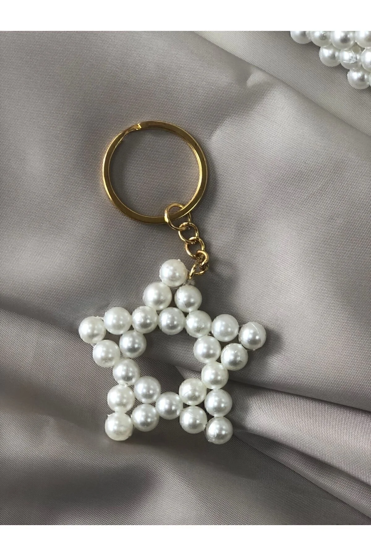 جلیقه کلید جاکلیدی کادویی ستاره مرواریدی 8 میلی متری مروارید و سفارش عمده موجود است. HobiMark25