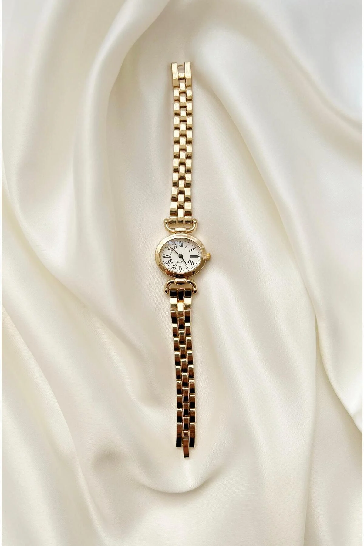 ساعت مچی زنانه مینیمال بند استیل رنگ طلایی BB0057 QUARTZ