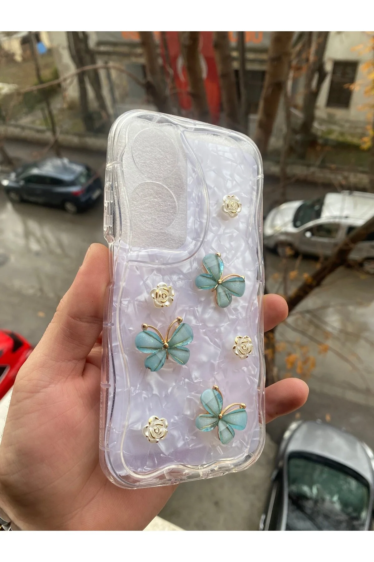 کاور و قاب سازگار OPPO A60 5D نقش برجسته پروانه ای لبه های پر زرق برق شفاف AQUA AKSESUAR
