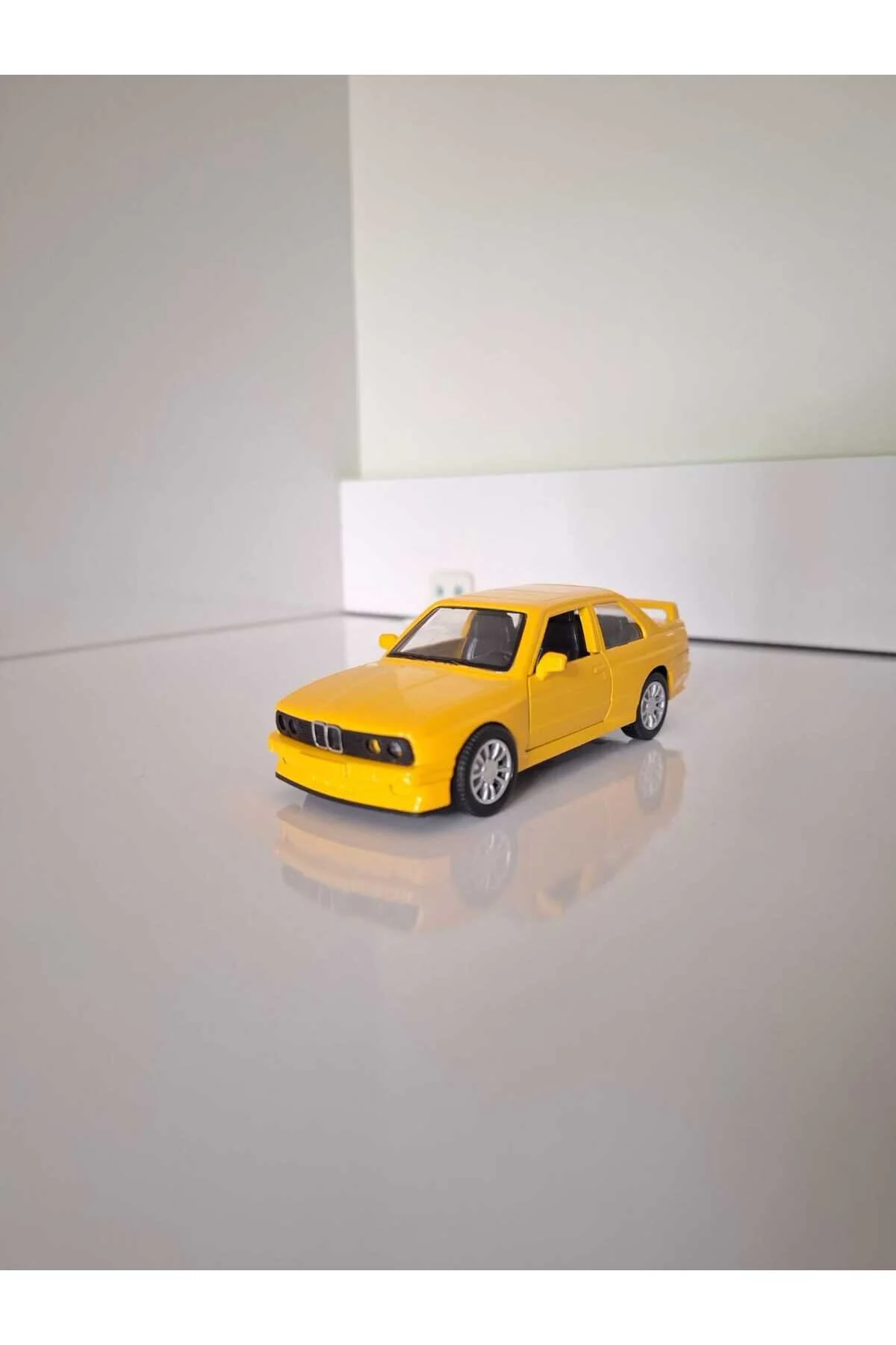 ماشین اسباب بازی فلزی زرد BMW E30 از ترکیه HOT WHEELS