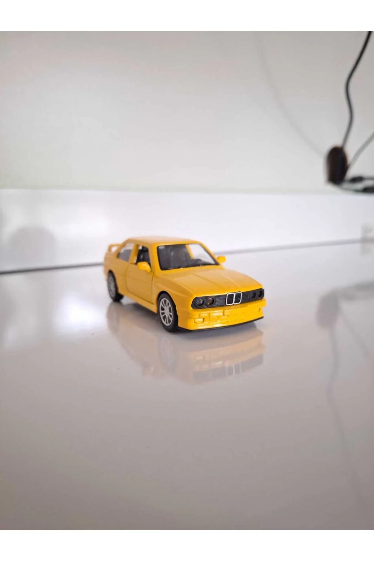 ماشین اسباب بازی فلزی زرد BMW E30 از ترکیه HOT WHEELS