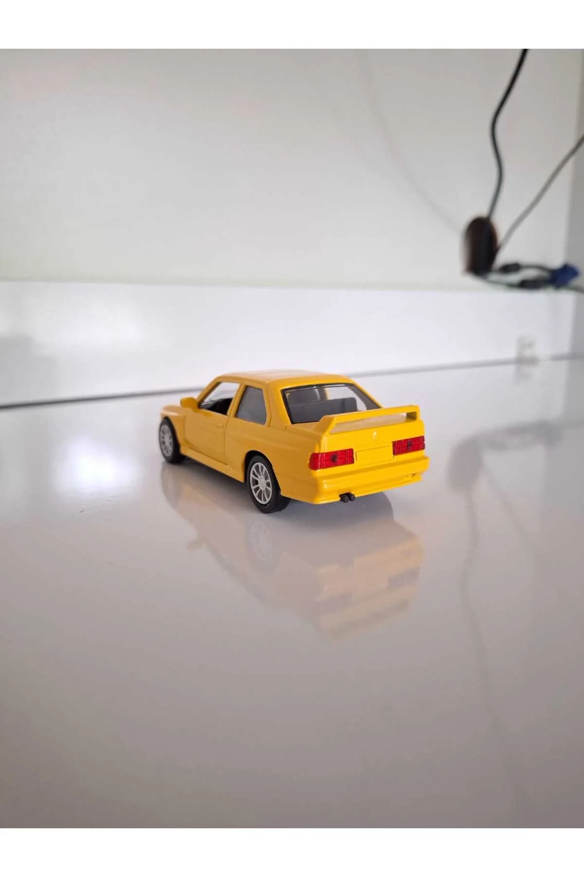 ماشین اسباب بازی فلزی زرد BMW E30 از ترکیه HOT WHEELS