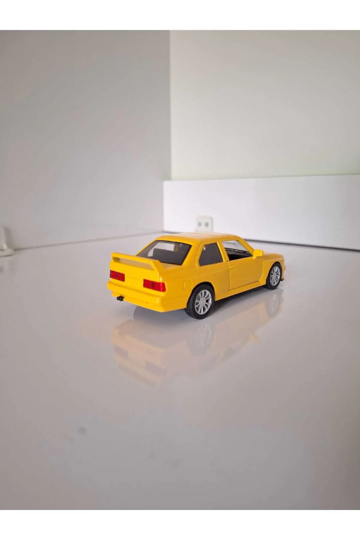 ماشین اسباب بازی فلزی زرد BMW E30 از ترکیه HOT WHEELS