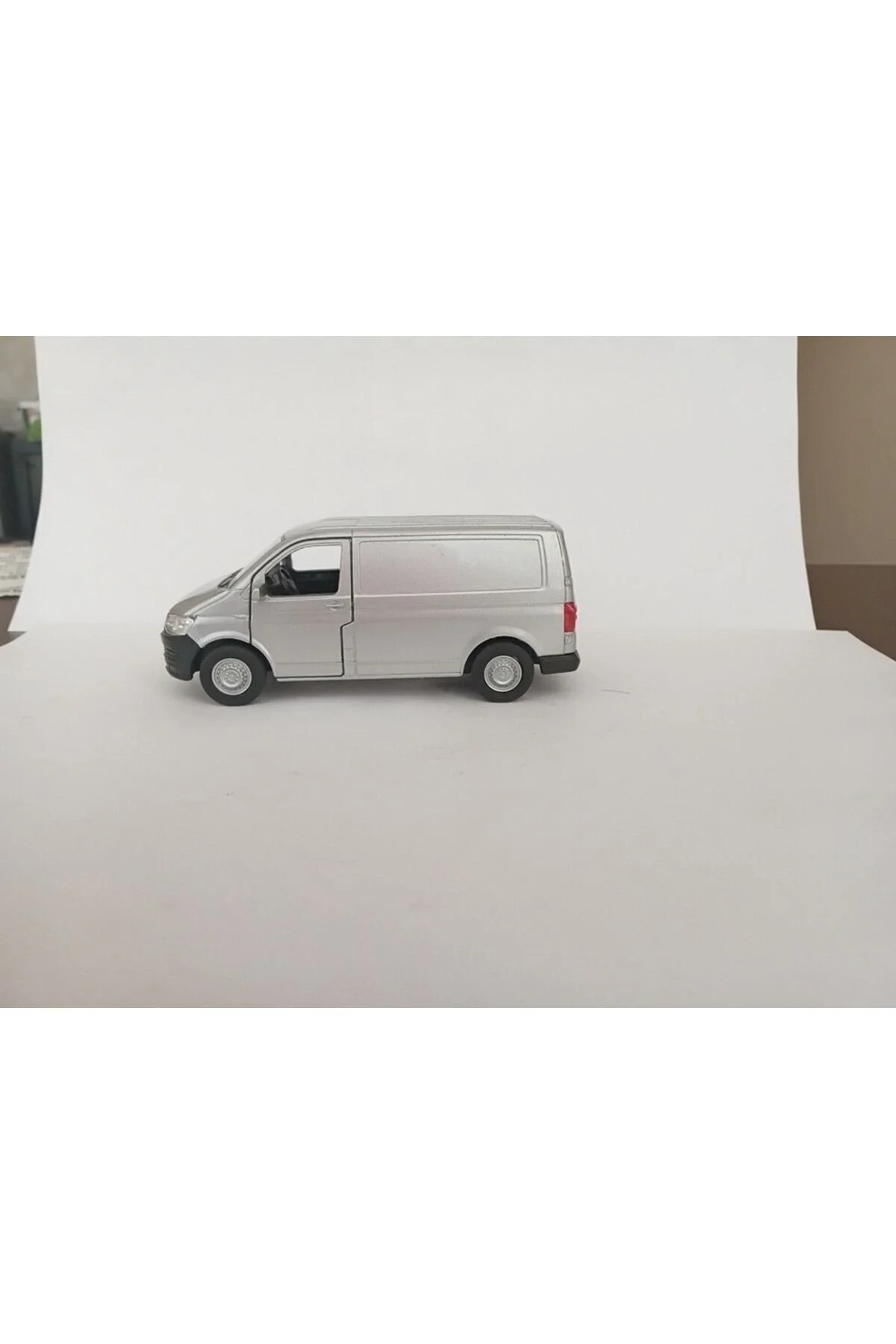 ماشین اسباب بازی 1:36 VOLKSWAGEN TRANSPORTER T6 VAN PULL DROP METAL MINIBUS GREY WELLY