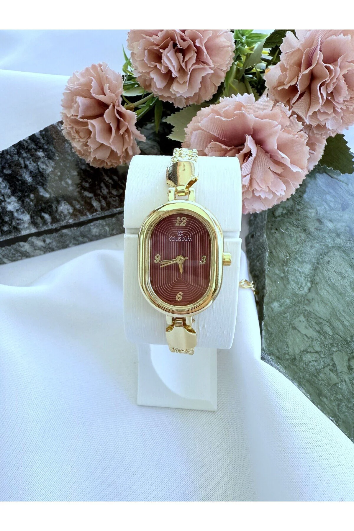 ساعت مچی زنانه طلایی بیضی رنگ داخلی CLARET RED Mazzy