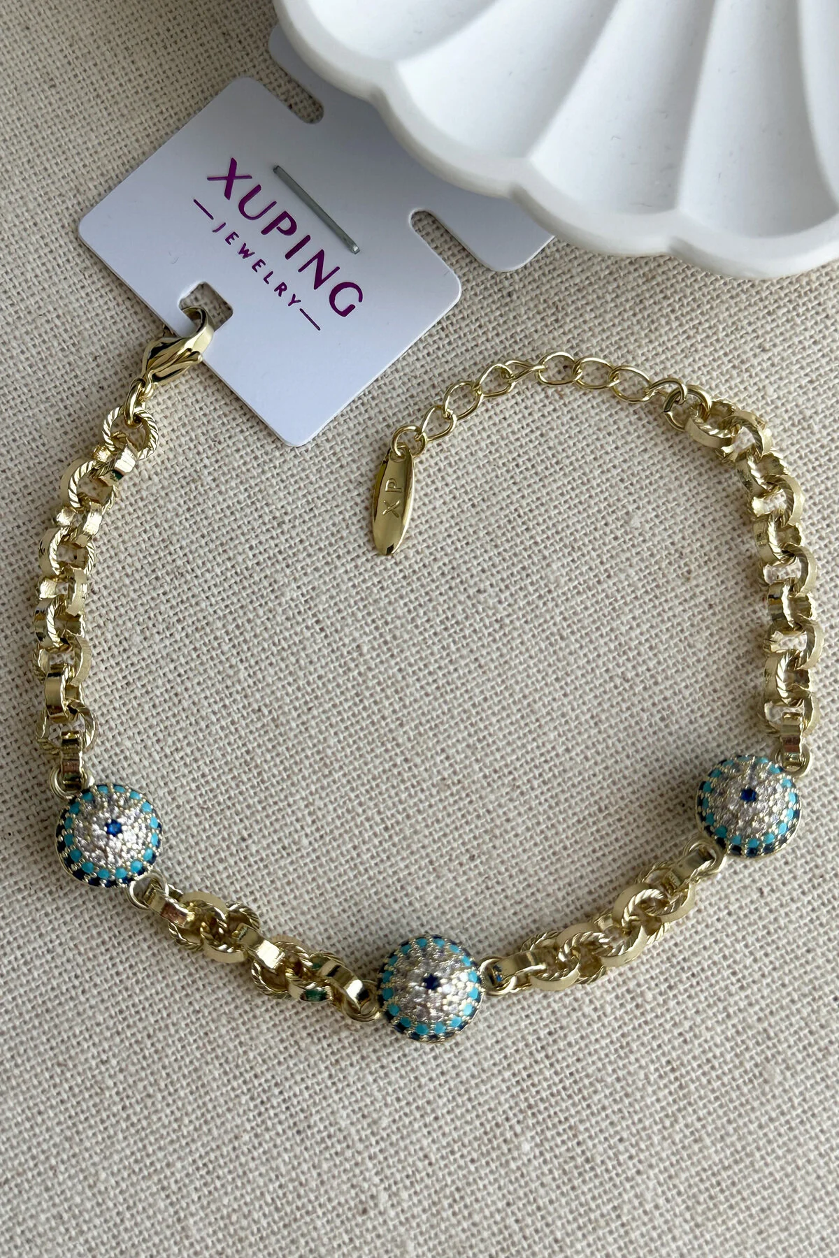 دستبند فولادی زنانه XPING 14K THREE BALL EVIL EYE STONE – 18+2 سانتی متر | جواهرات ژوپینگ ضد تیرگی رنگ طلایی Modacaprea