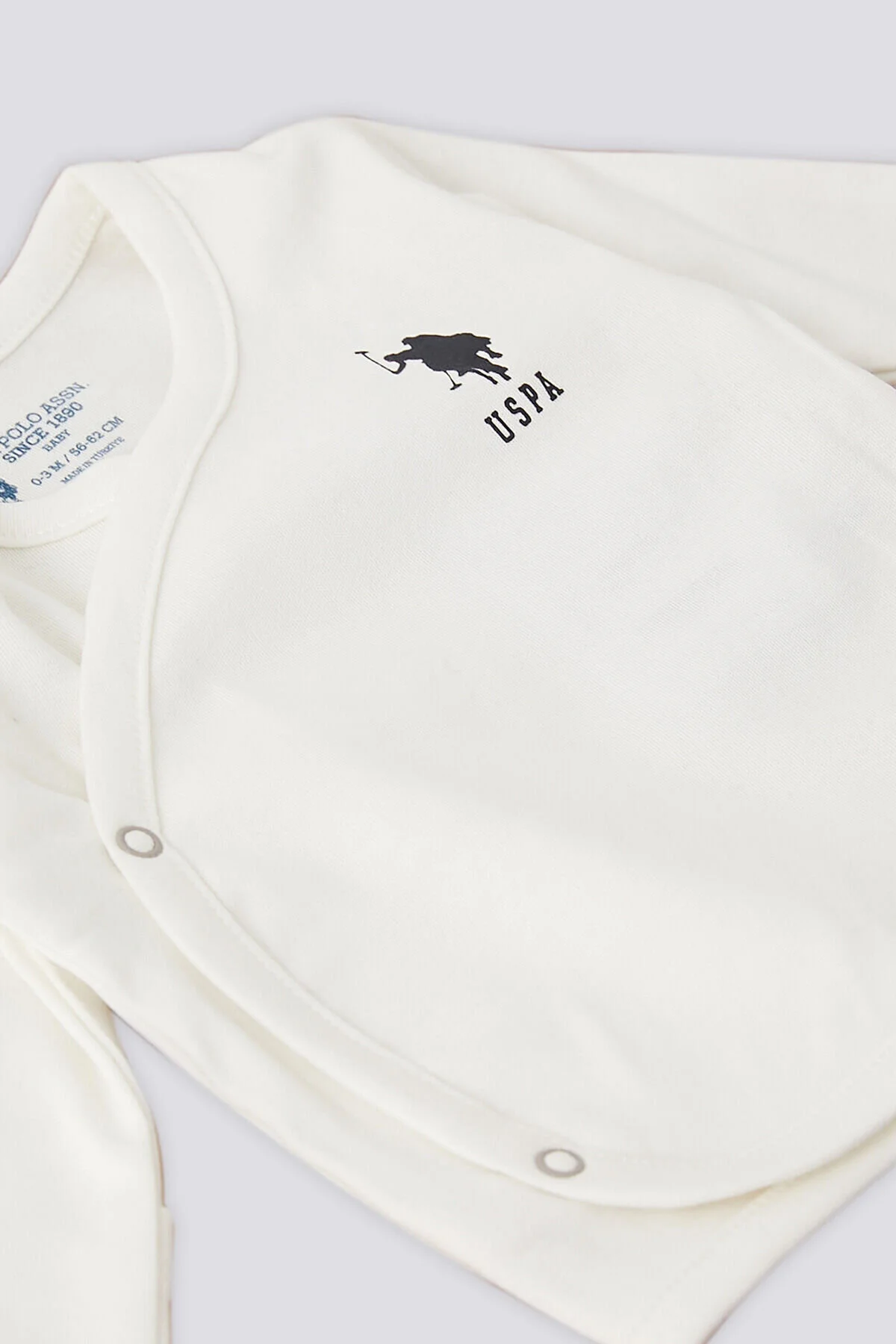 U.S. Polo Assn. پایه. ست ترخیص بیمارستانی نوزاد 10 تکه کرم پلنگی Polo Assn