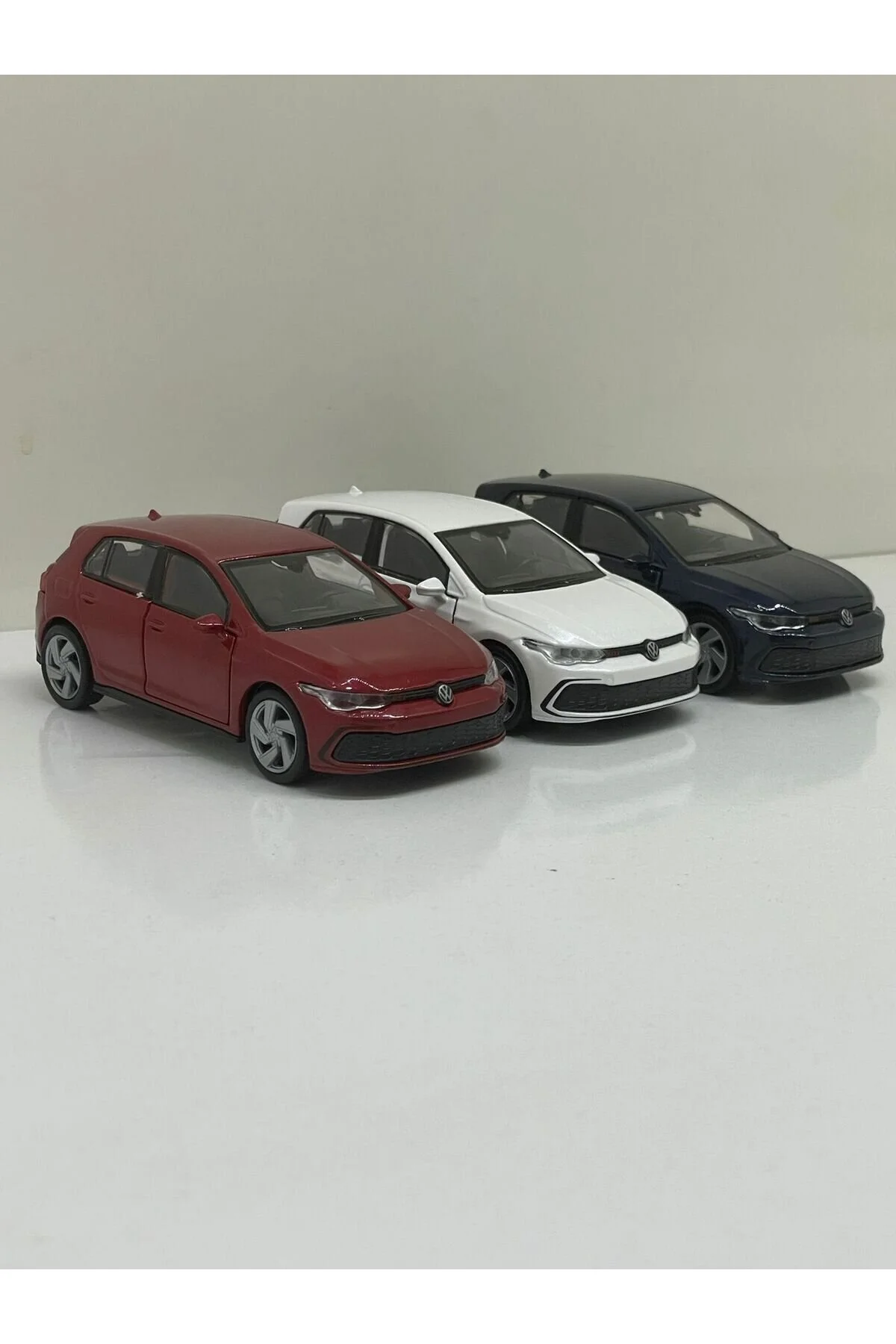 ماشین اسباب بازی VW GOLF 8 METAL PULL AND DROP TOY CAR 12 CM قیمت یک محصول است. Shem