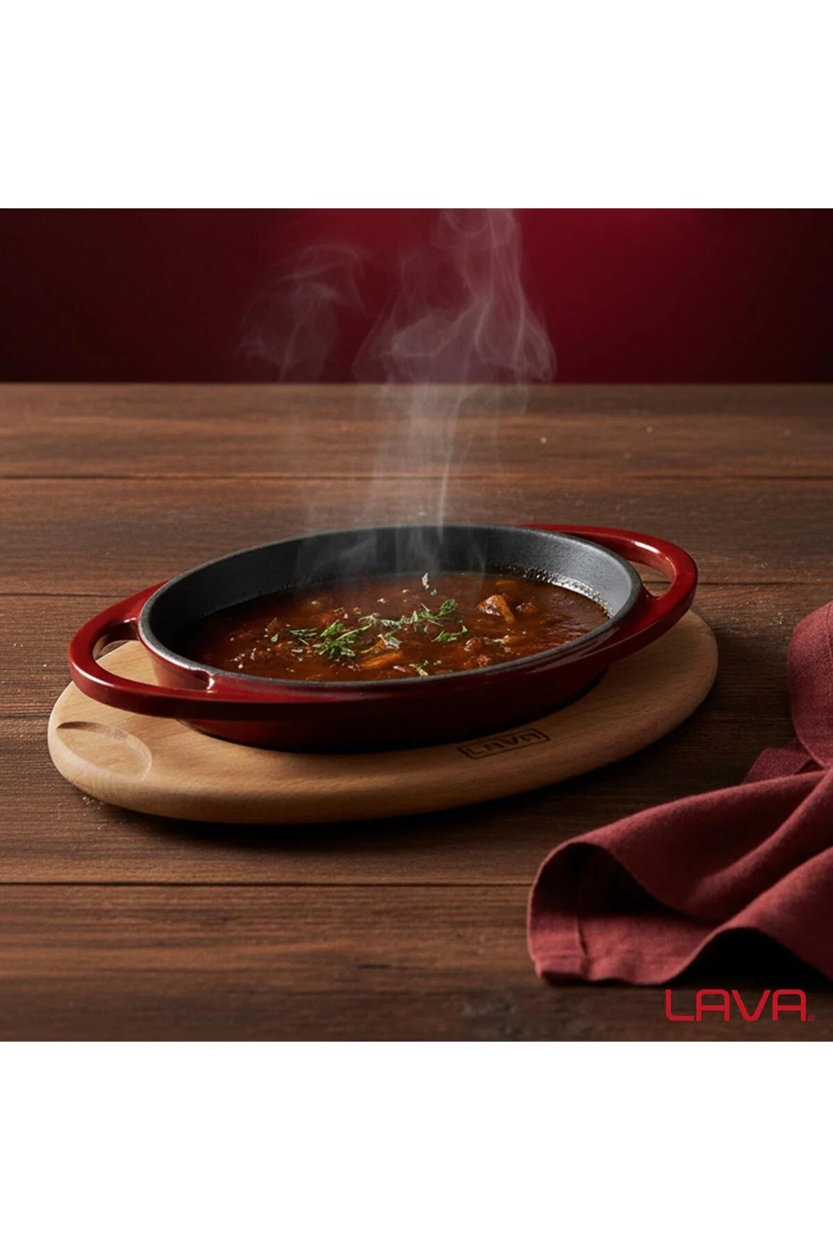 تابه کاسه بیضی ریخته گری چدن جامد دو دسته چوب راش در ابعاد 15X10 سانتی متر کلارت قرمز Lava