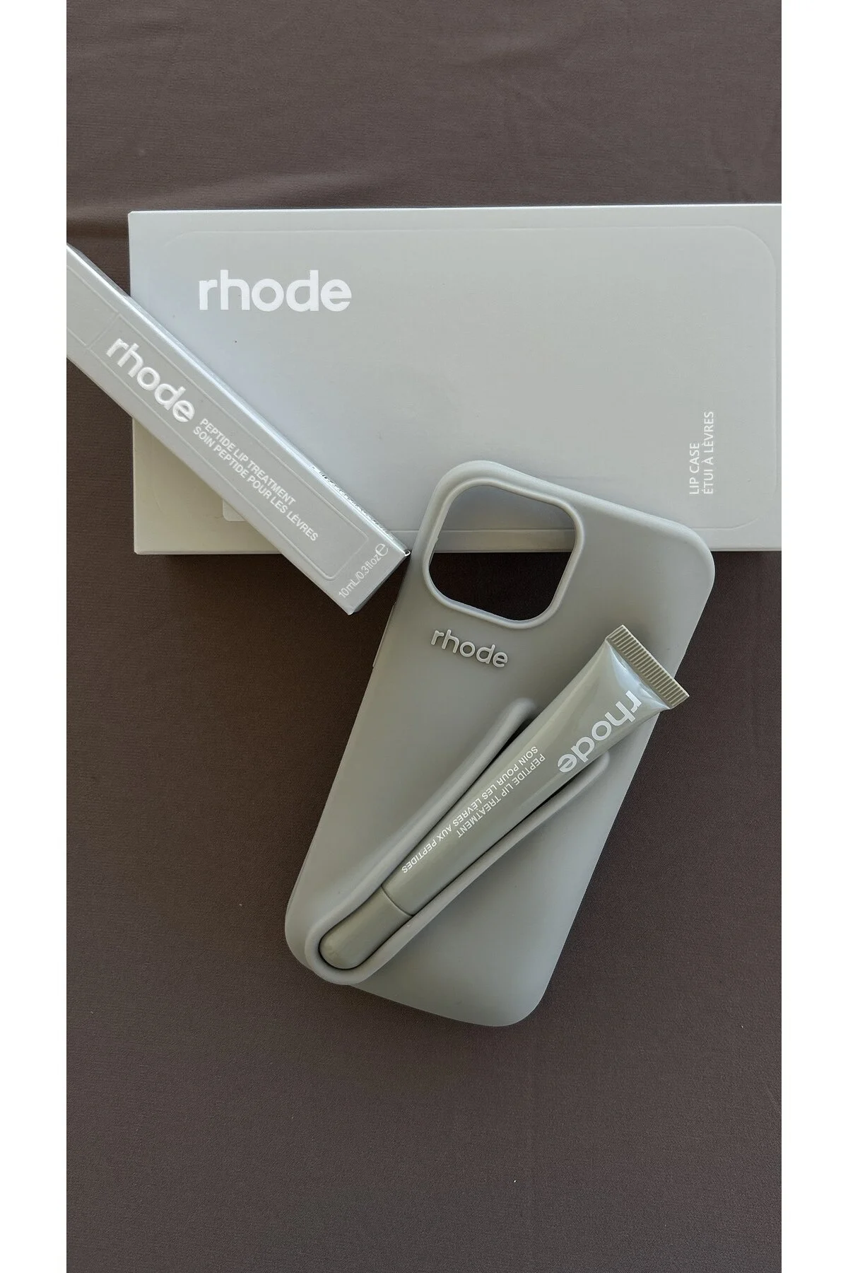 کاور و قاب RHODE GREY + رژ لب سازگار با آیفون 13 14 15 StoreCase