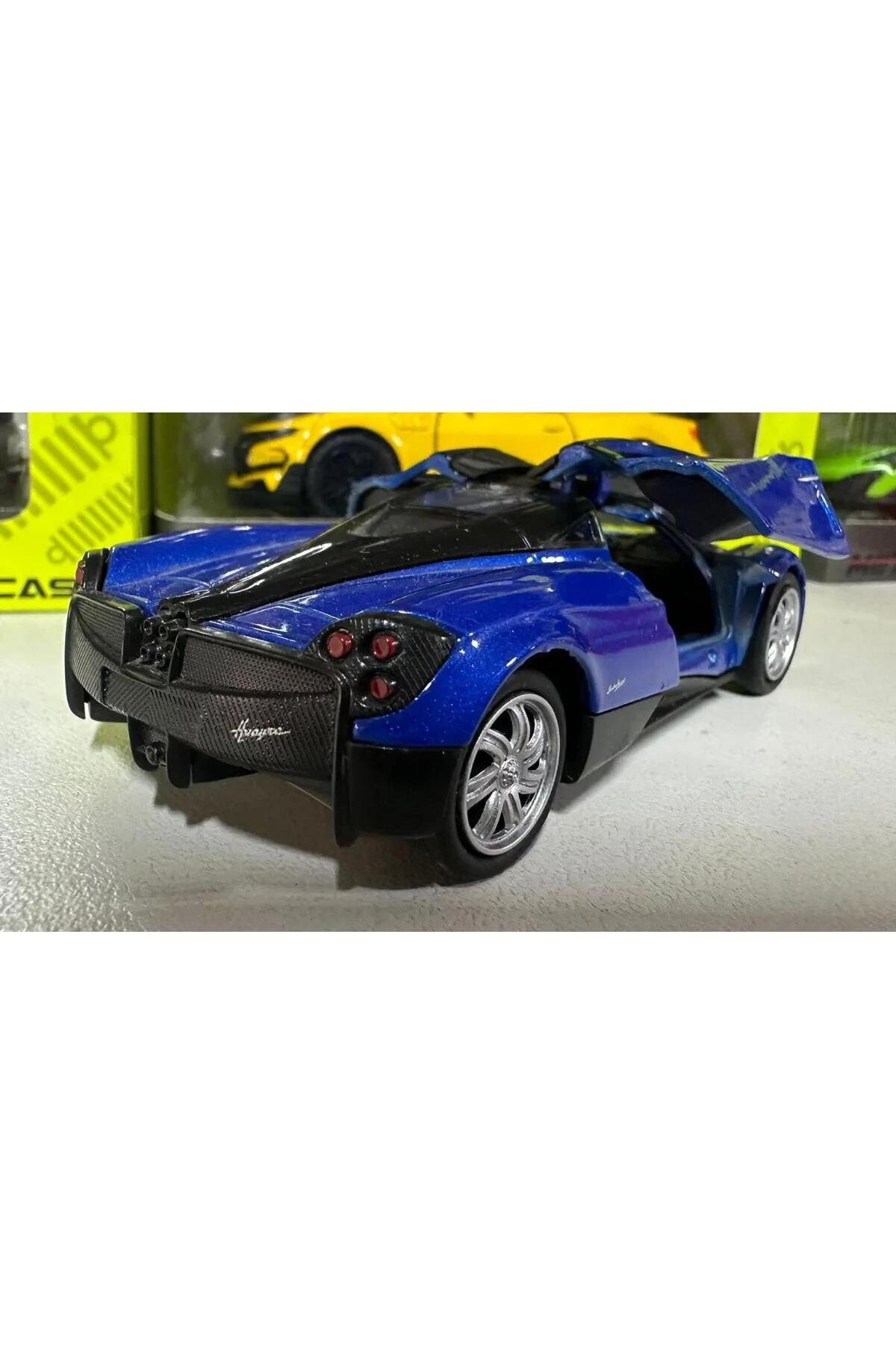 مدل خودرو اسباب بازی ماشین فلزی 1 36 چک قطره آبی PAGANI HUAYRA اورجینال WELLY
