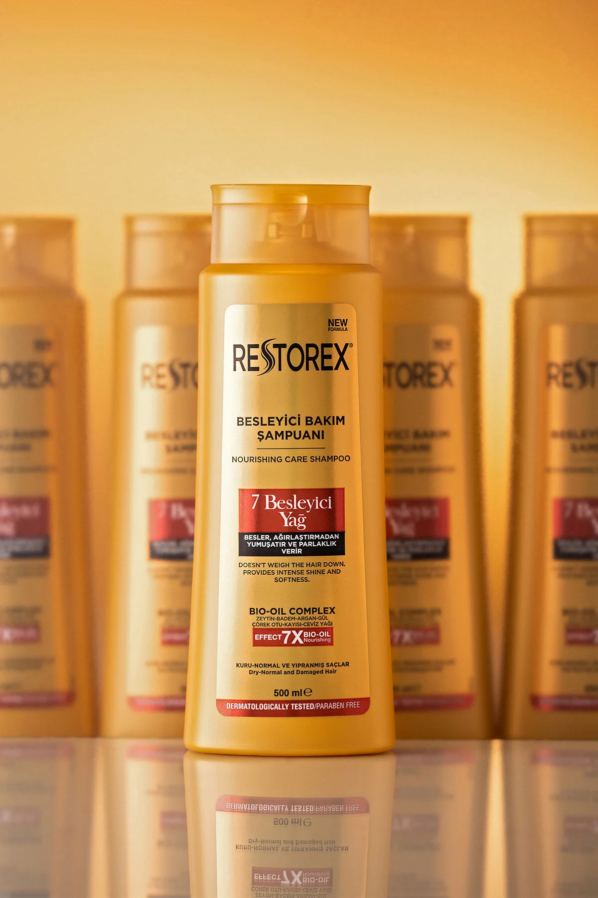 شامپو مراقبت و تغذیه کننده 500 میلی لیتر با 7 روغن مغذی برای درخشندگی و نرمی ابریشمی Restorex