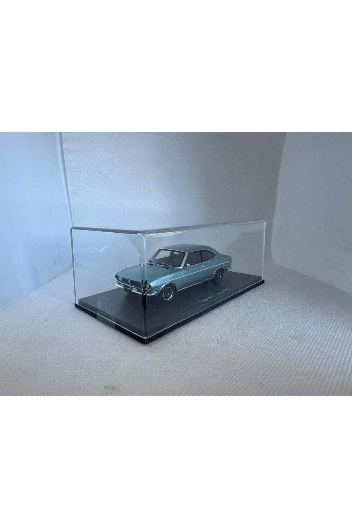 مدل خودرو 1:43 MAZDA RX 2 COUPÉ 1970 LIGHT BLUE METALIC 43U00096 | ماشین ریخته گری Schuco