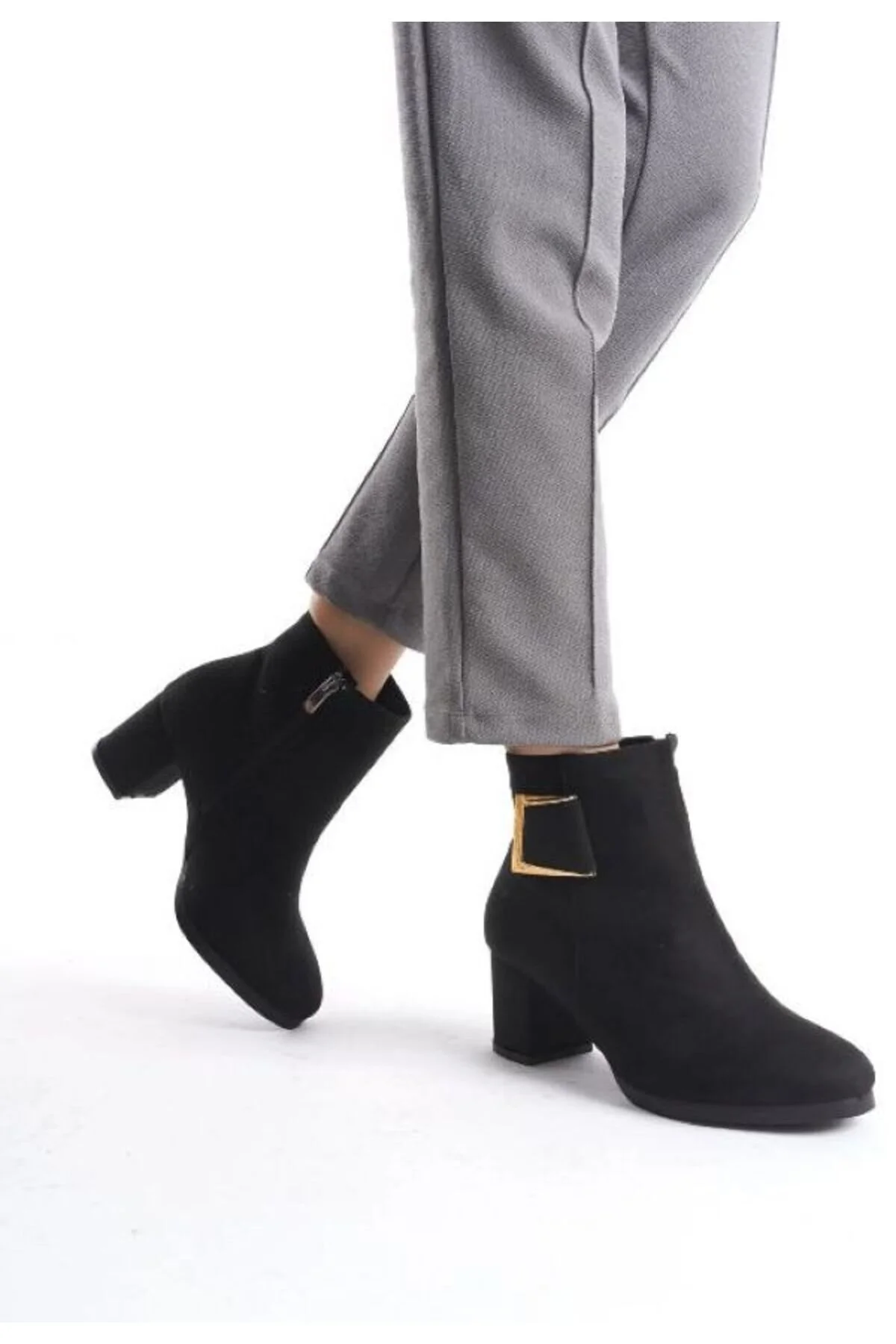 چکمه و بوت های زنانه کوتاه پاشنه دار مشکی با سگک جیر EM SHOESS