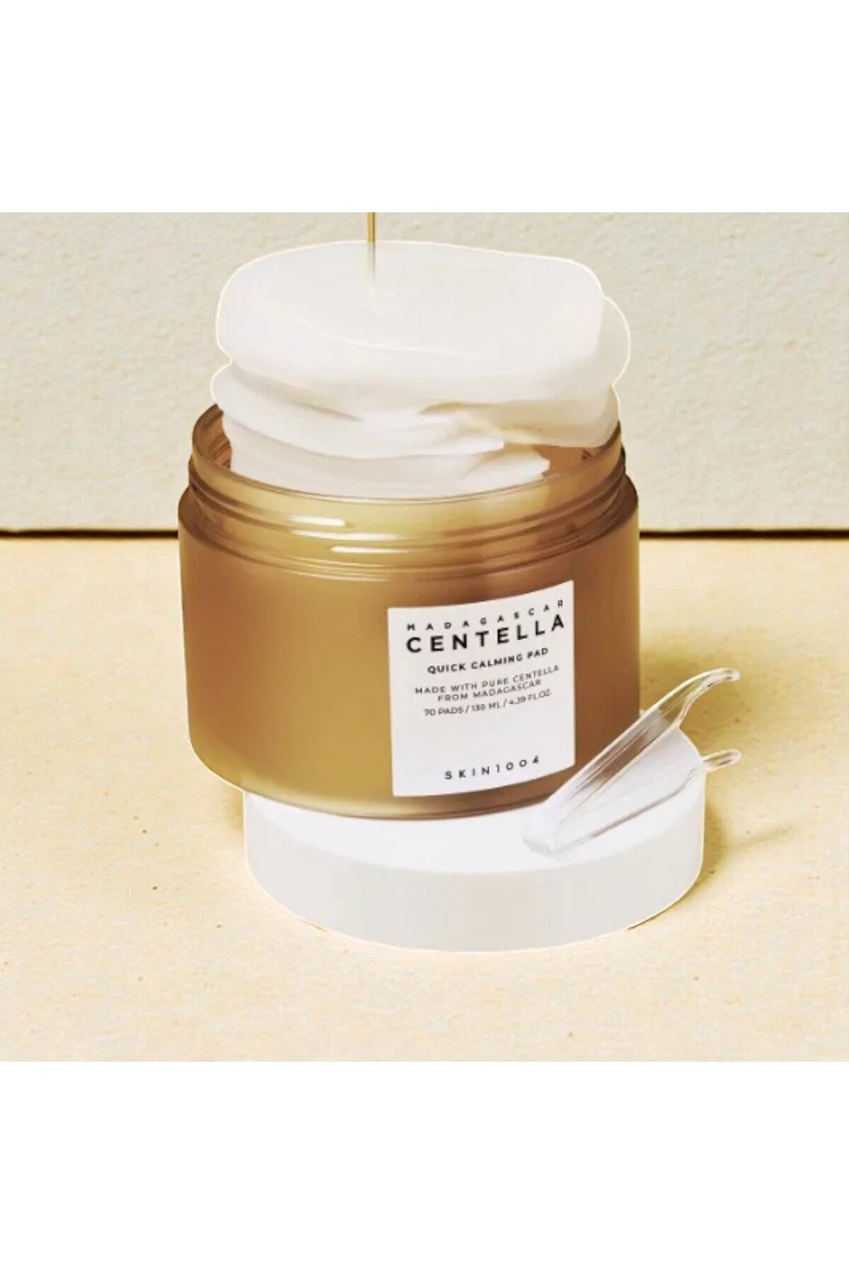 اسفنج آرایشی MADAGASCAR CENTELLA FAST CONDISER PED SETTARER استخراج پد تونیک Skin1004