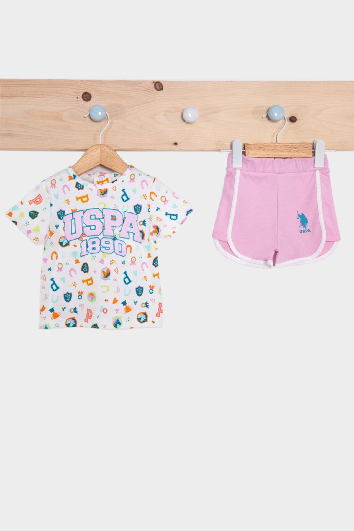 U.S. Polo Assn. پایه. ست شورت دخترانه صورتی کرم پولو اسن