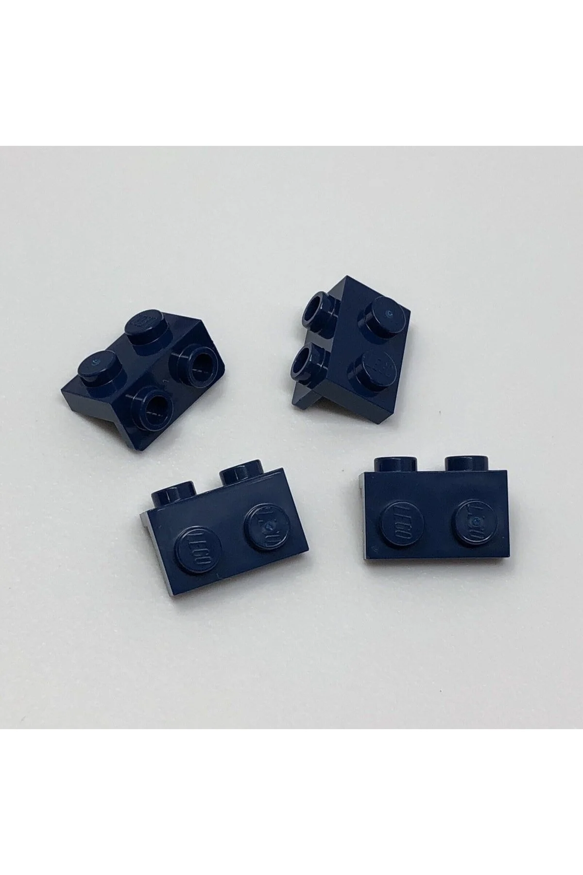 قطعه اتصال اورجینال مدل Bracket 1 X 2 رنگ لاجوردی بسته 4 عددی لگو Lego